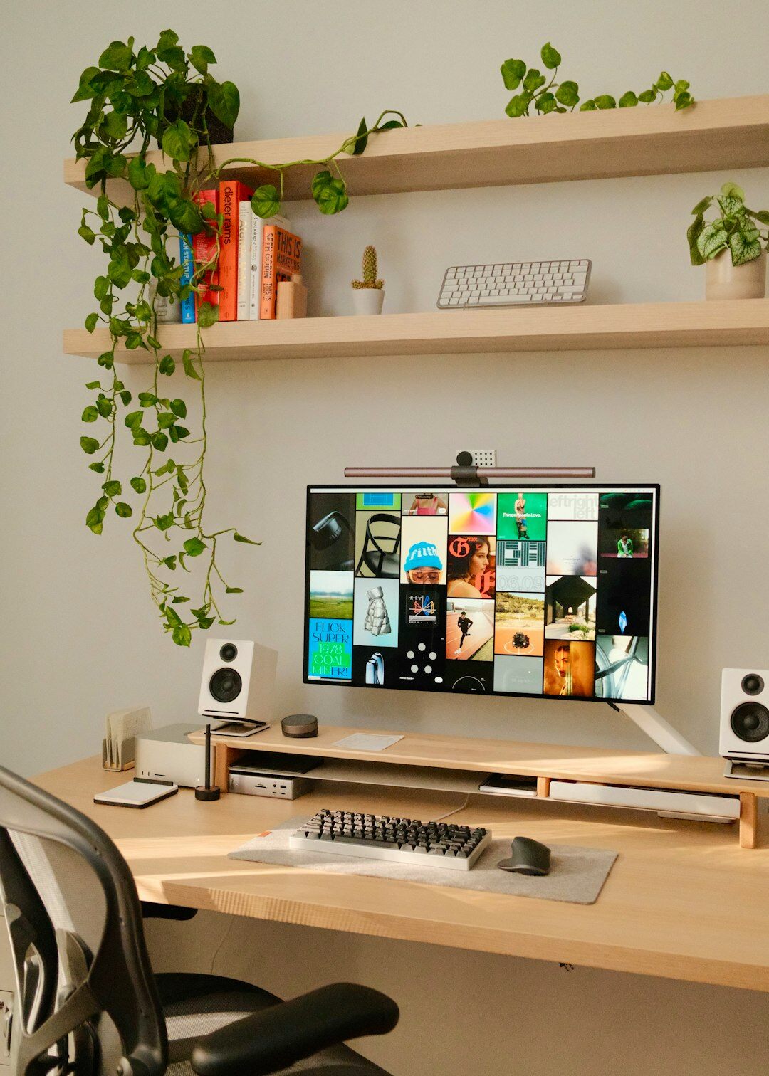 Content creator recording a video at a home studio desk