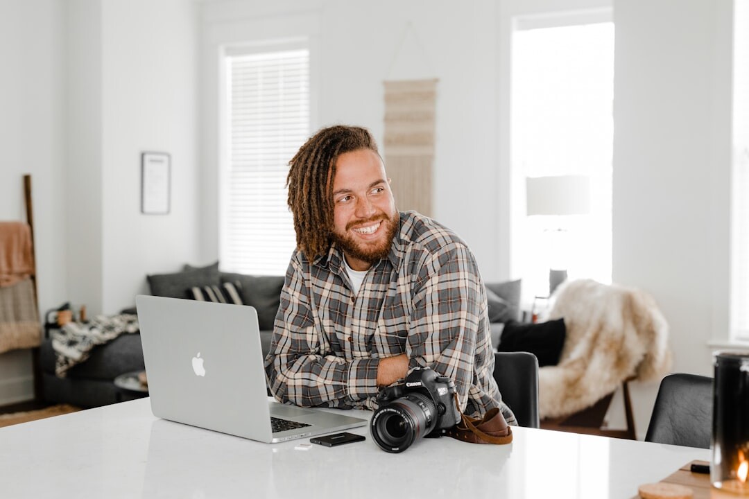 Man podcaster smiling in casual clothing